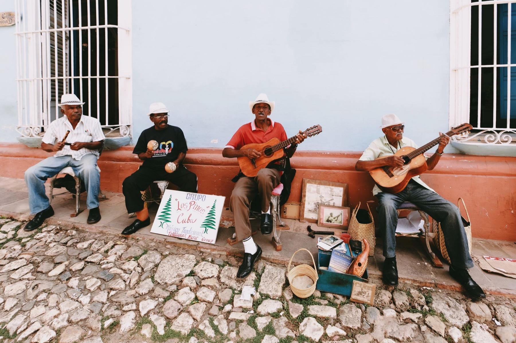 A trio of musicians playing traditional Cuban son on the street